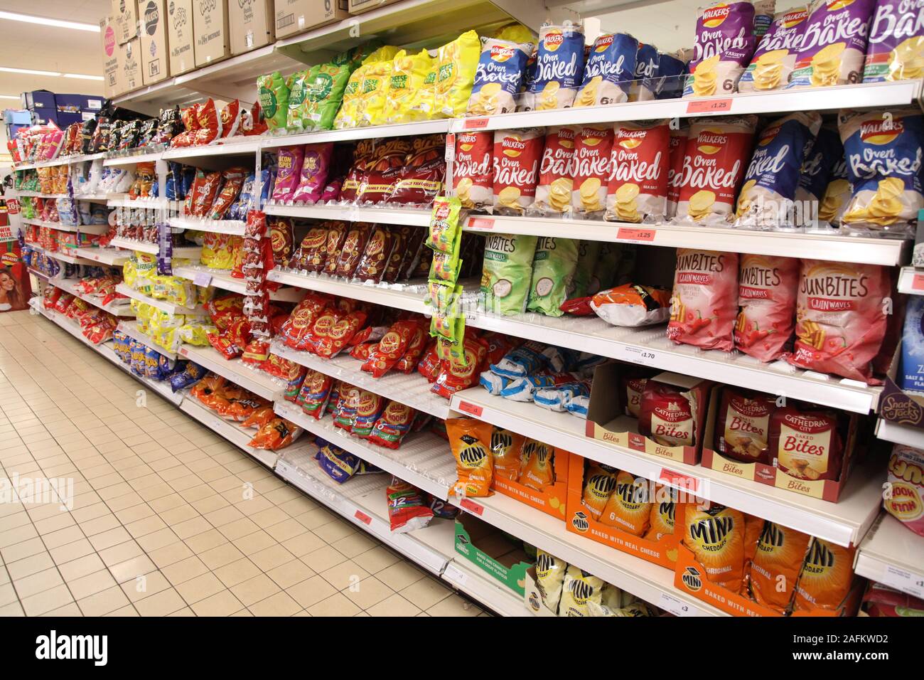 Sainsburys supermarket crisps and snacks aisle, December 2019 Stock