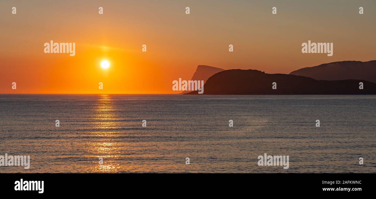 SOMMARØYA, NORWAY - Midnight sun, Troms, northern Norway. Stock Photo