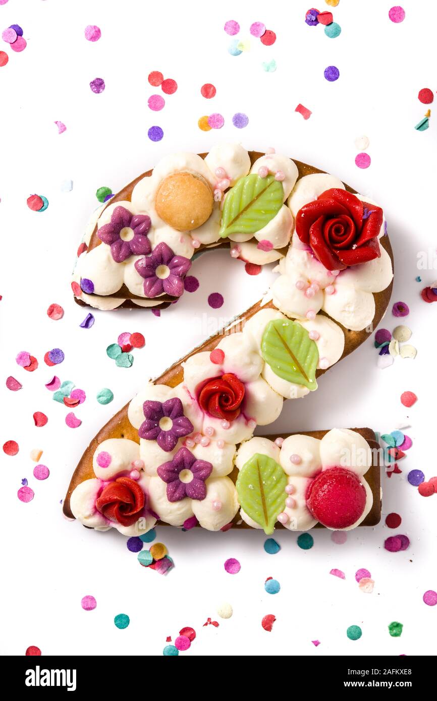 Number Two Cake Decorated With Flowers Macarons And Confetti