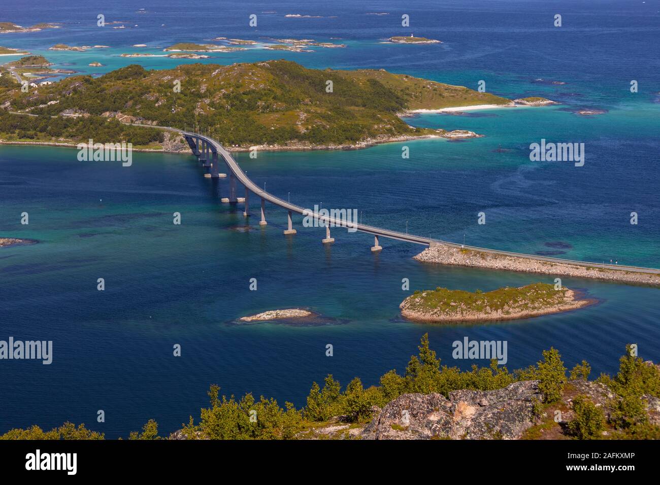 SOMMARØYA, TROMS COUNTY, NORWAY - Bridge connects group of islands in northern Norway. Stock Photo