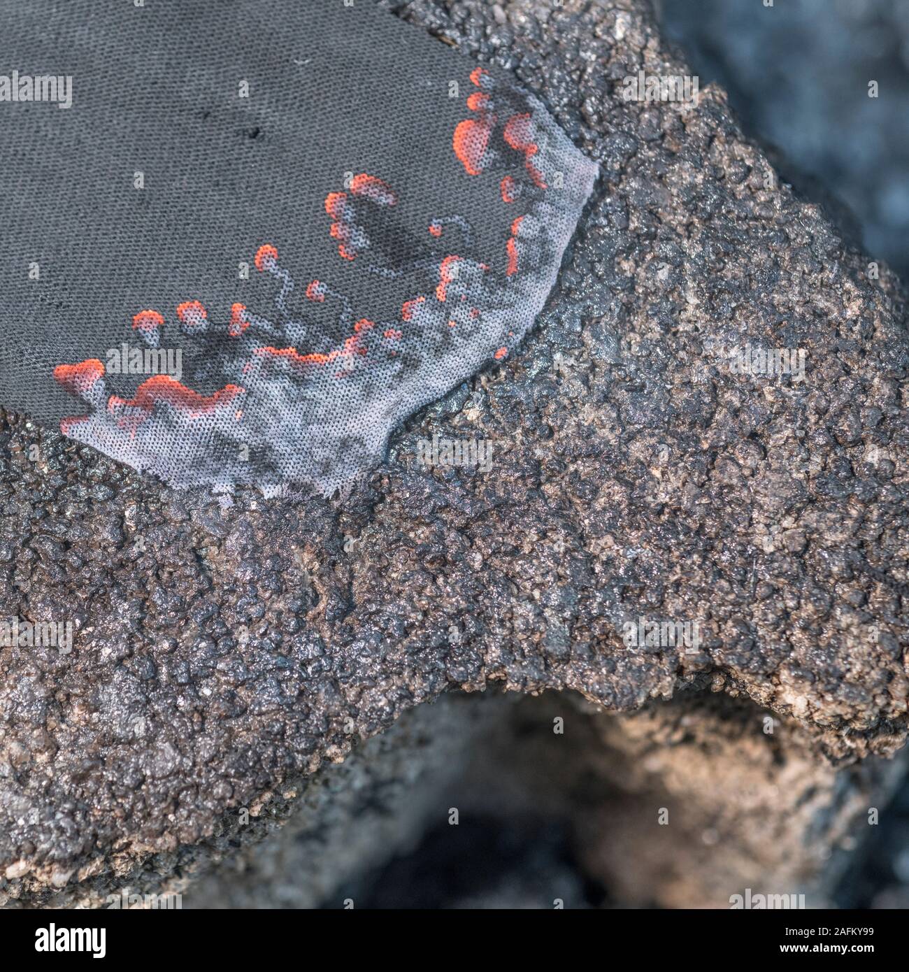 Survival skills. Close shot of burning charcloth. Material is used in