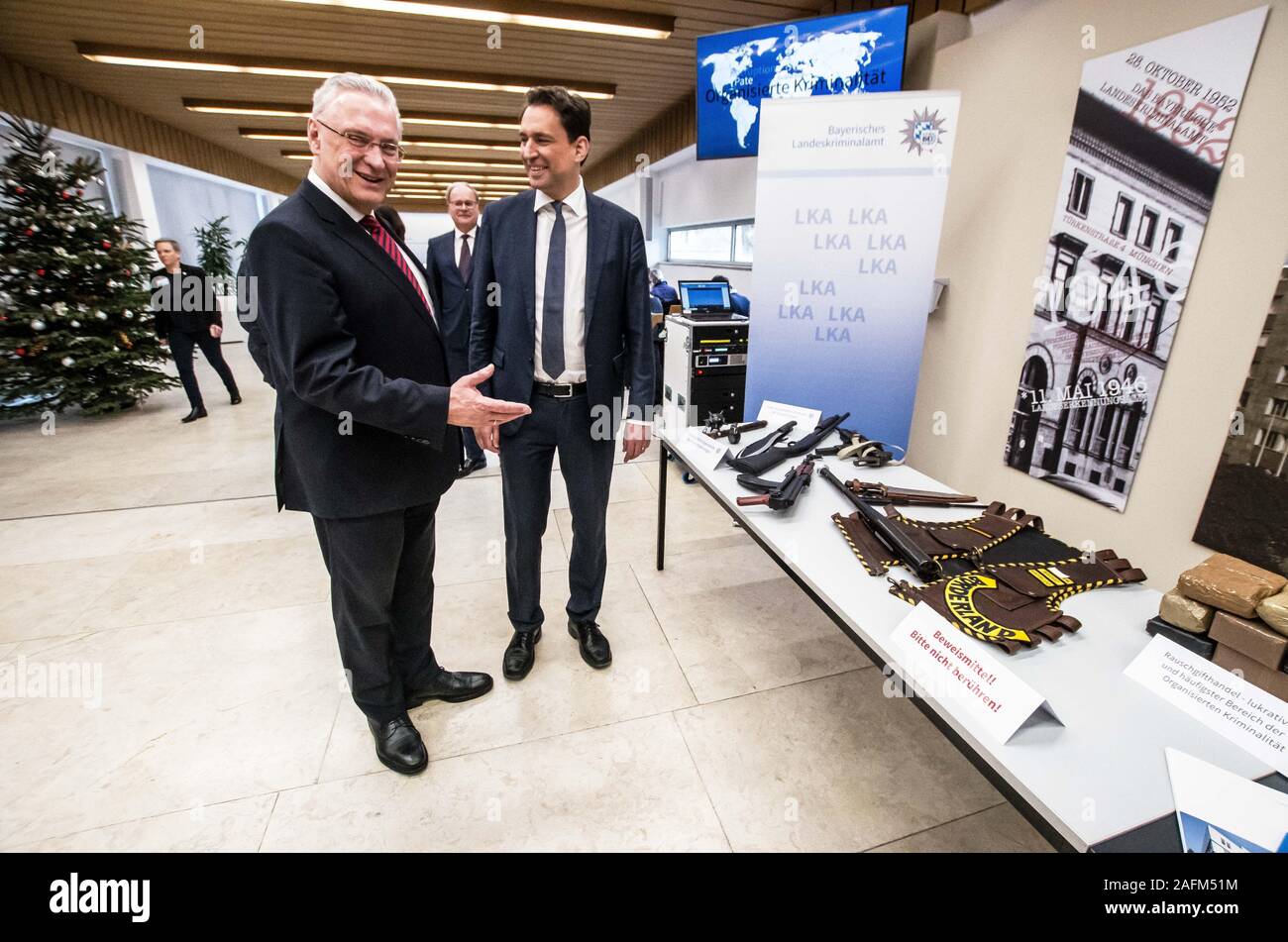 Munich, Bavaria, Germany. 16th Dec, 2019. JOACHIM HERRMAN, Bavarian Interior Minister with GEORG EISEINREICH, Justice Minister of Bavaria. Bavarian Interior Minister Joachim Herrmann, Justice Minister George Eisenreich, Bavarian Landeskriminalamt (Crime Office) preisdent Robert Heimberger, and Bavarian Attorney General Reinhard RÃ¶ttle (Reinhard Roettle) presented the results of the war on organized crime in Bavaria, In 2018 alone, the damages to the state totaled some 169 million Euros, a staggering increase from 2017's figure of 12 million. Processes against organized crime have cost Stock Photo
