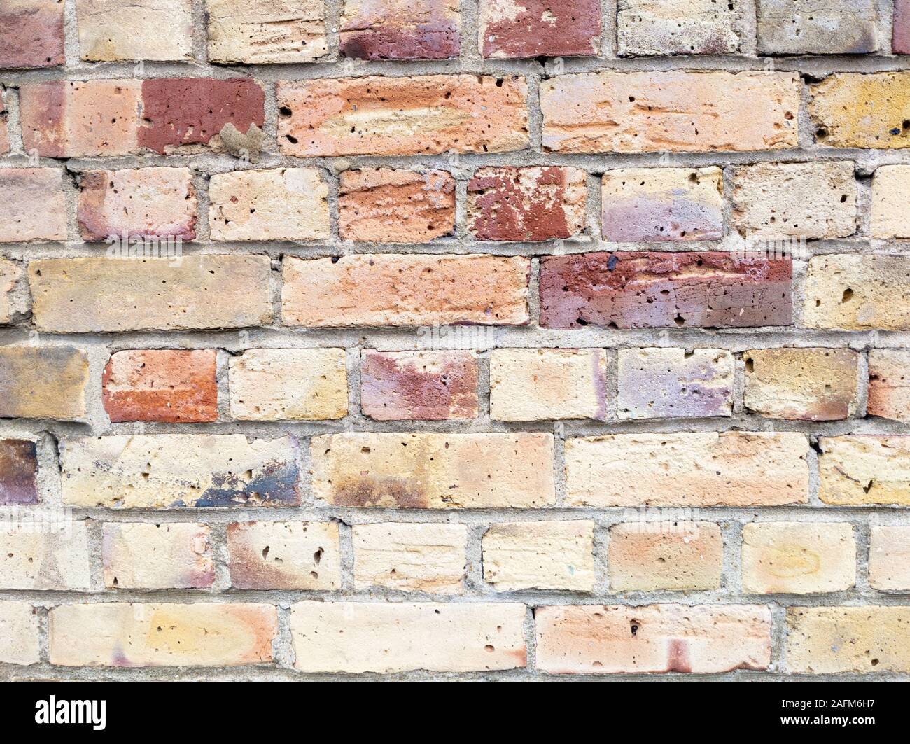 Full frame orange and red brick wall Stock Photo