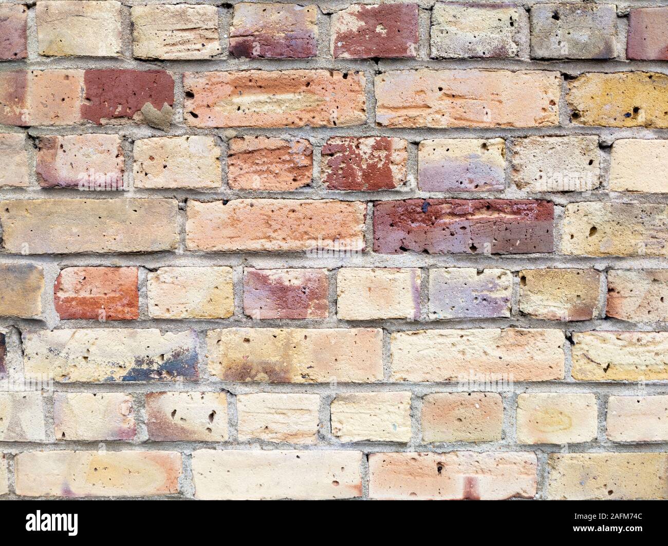 Full frame orange and red brick wall Stock Photo