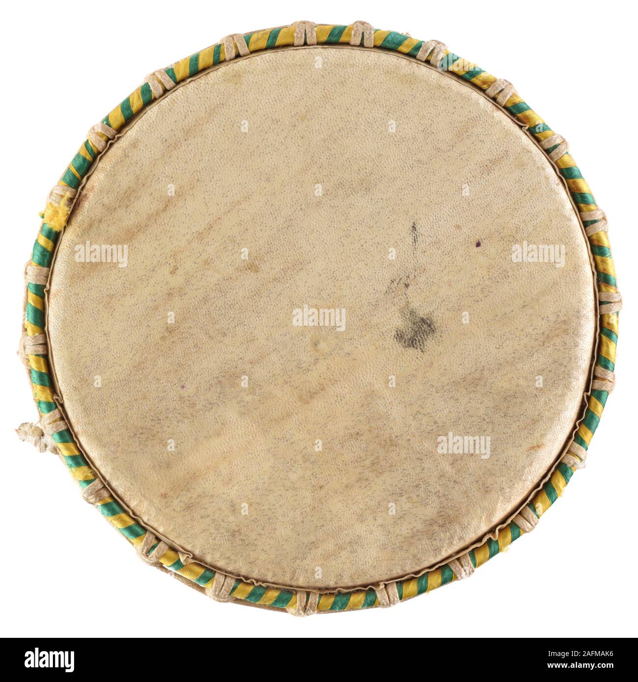 Ethnic musical instrument. African drum top made of goat skin isolated