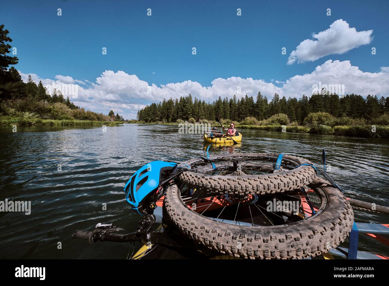 Bike pack rafting the Deschutes river in Central Oregon. Stock Photo