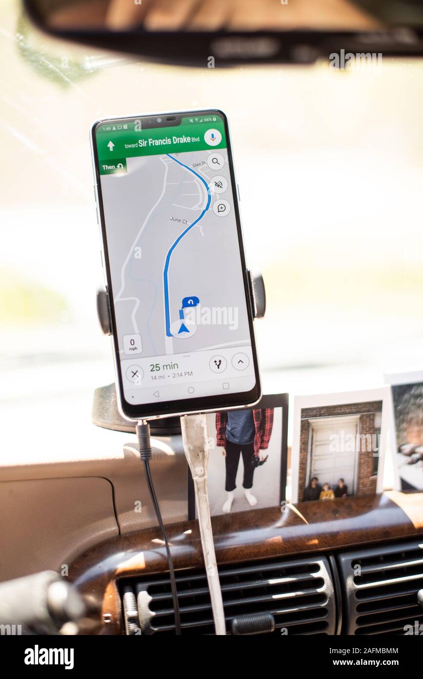 Detail of smart phone in dash cradle with directions for road travel Stock Photo