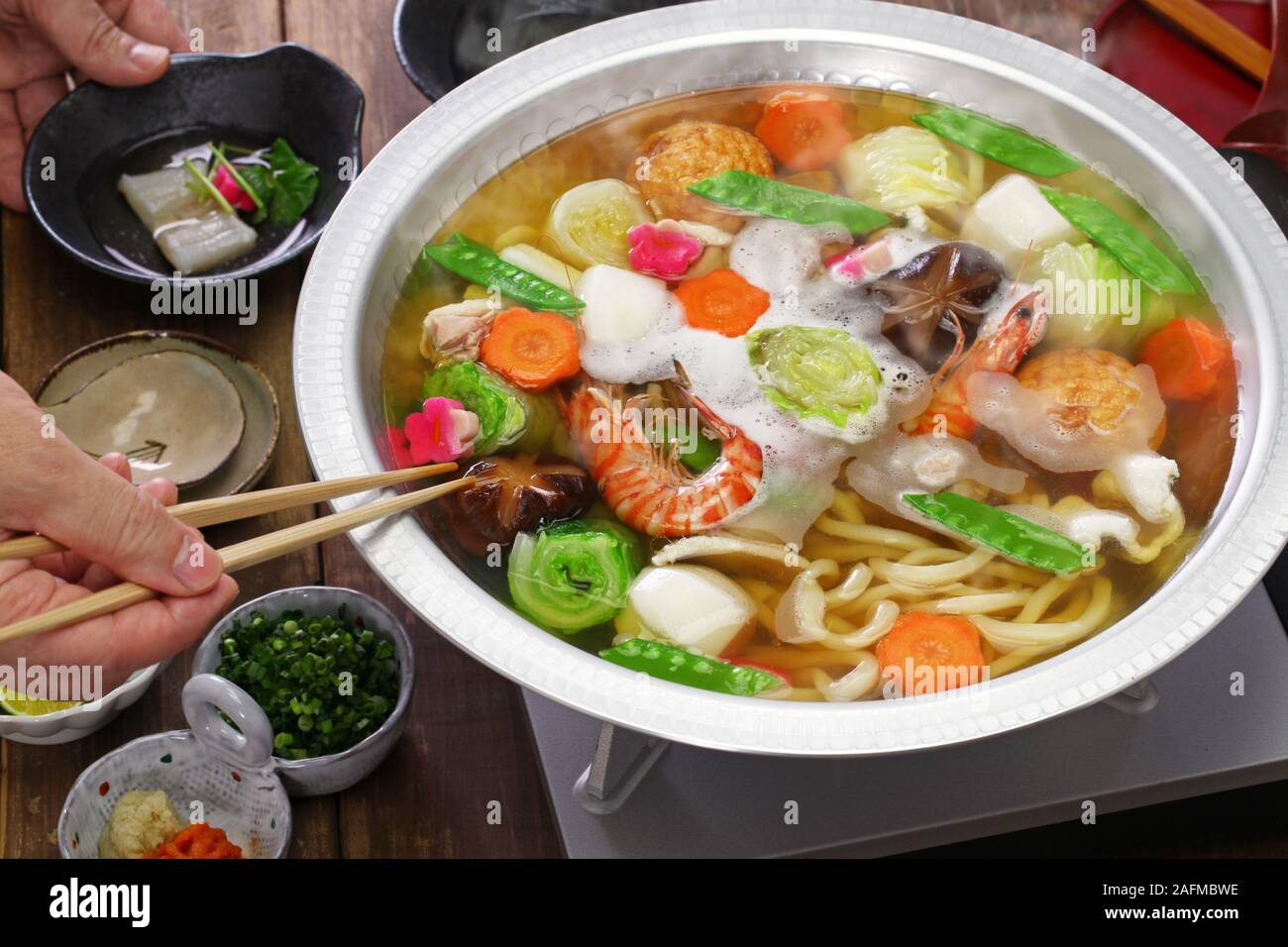 japanese cuisine, udon suki, hot pot with udon noodles and fresh