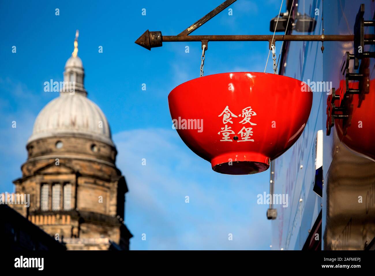 Sign in the form of a rice bowl on a Chinese restaurant on South Bridge, Edinburgh, Scotland, UK