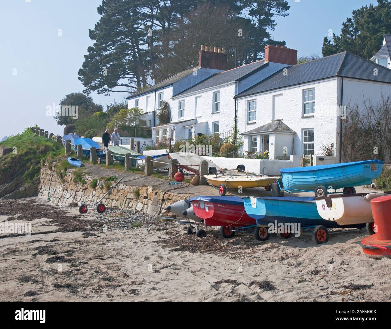Row Of Cottages Which Overlook The Beach And The Helford River At