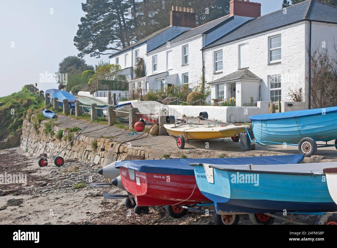 Row Of Cottages Which Overlook The Beach And The Helford River At