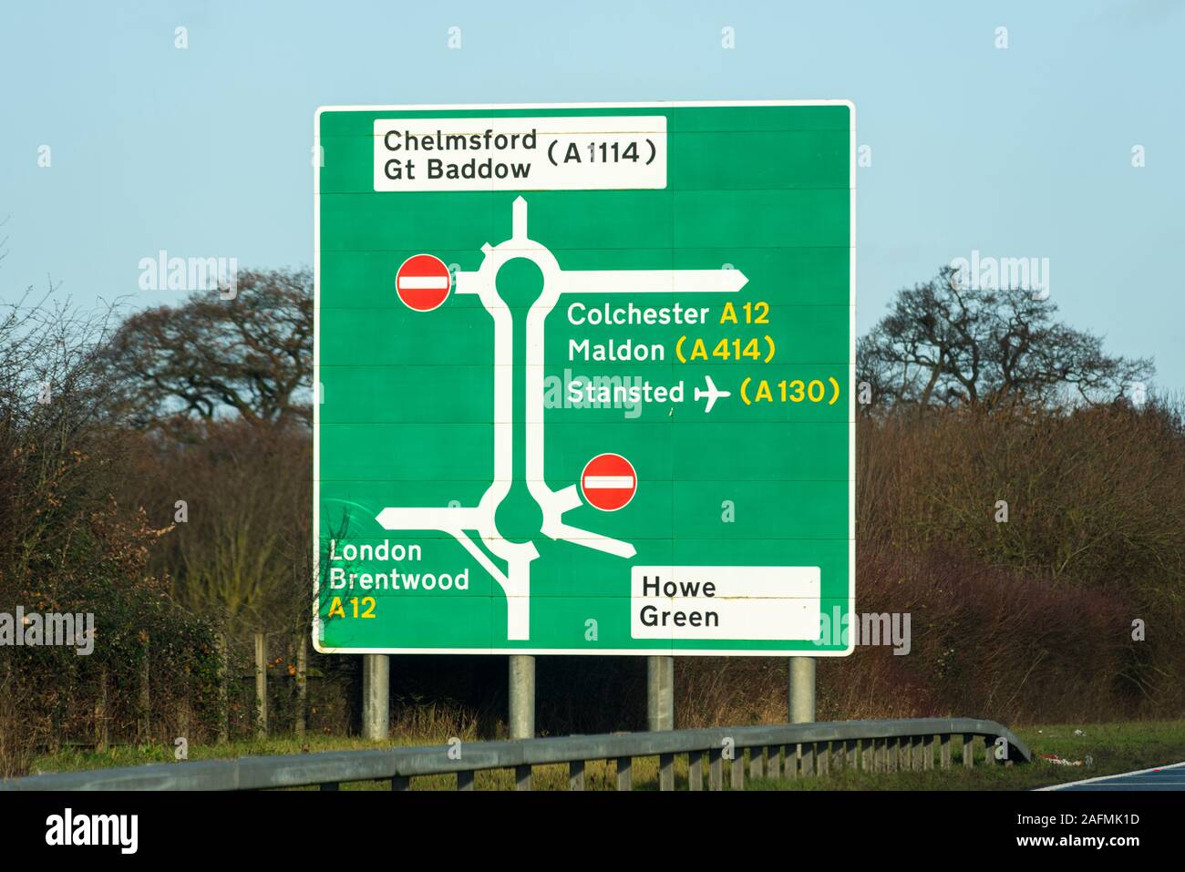 Destination sign with town names, directions approaching A12 Chelmsford, Essex, UK on a stretch of A130 duel carriageway. Colchester, Maldon, Stansted Stock Photo