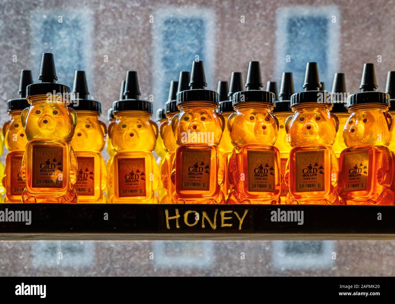 Honey bears on a farm market shelf, Vermont, USA. Stock Photo