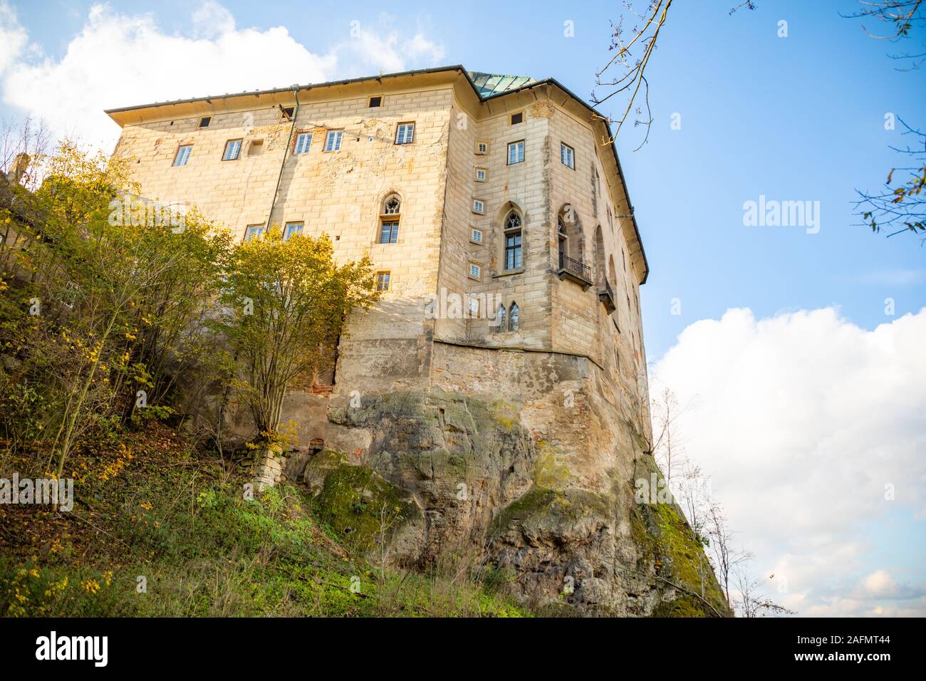Illustration of the Woman in White in a castle hallway