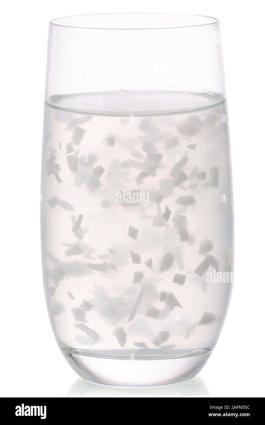 Coconut water with pulp in a highball isolated Stock Photo Alamy