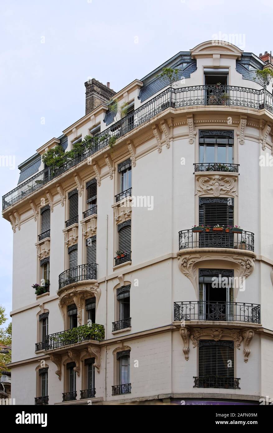 corner building, apartments, wrought iron balconies, decorative