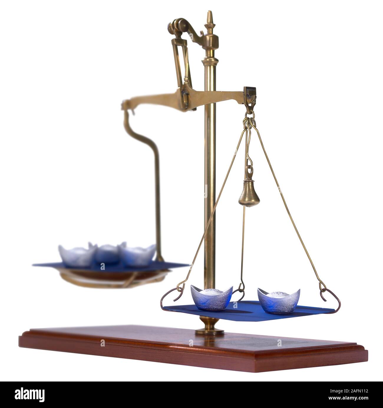 Antique scale weighing imbalance Stock Photo
