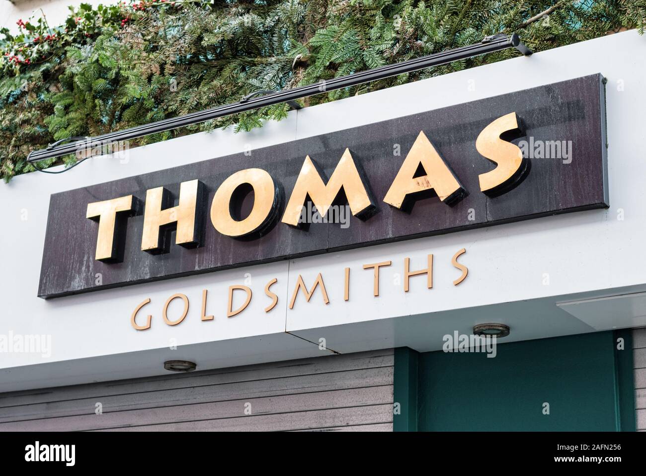 Derry, N. Ireland -Dec 15, 2019: The sign outside Thomas Goldsmiths in Derry, Northern Ireland Stock Photo