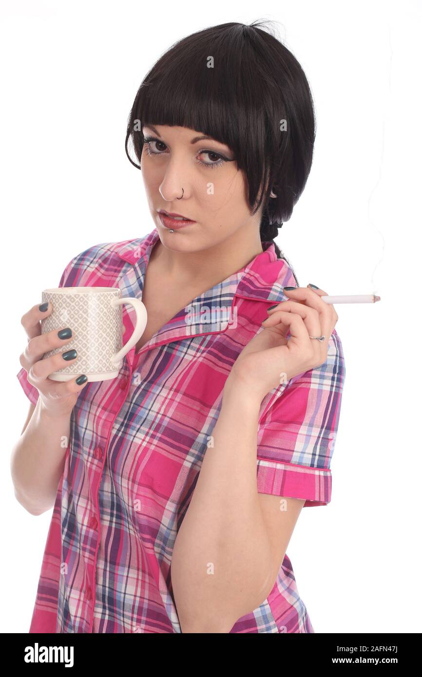 May 2015 - Young woman in her pajamas ready for bed Stock Photo