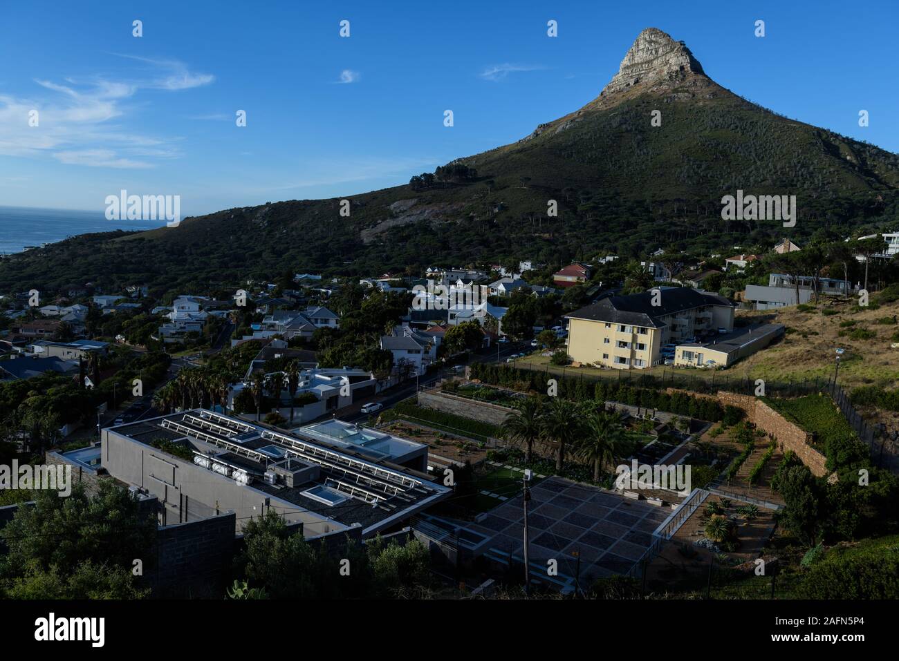 Cape Town's Lion's Head mountain above the Atlantic sea coastal suburb of Camps Bay, which ranks as some of South Africa's most expensive property Stock Photo