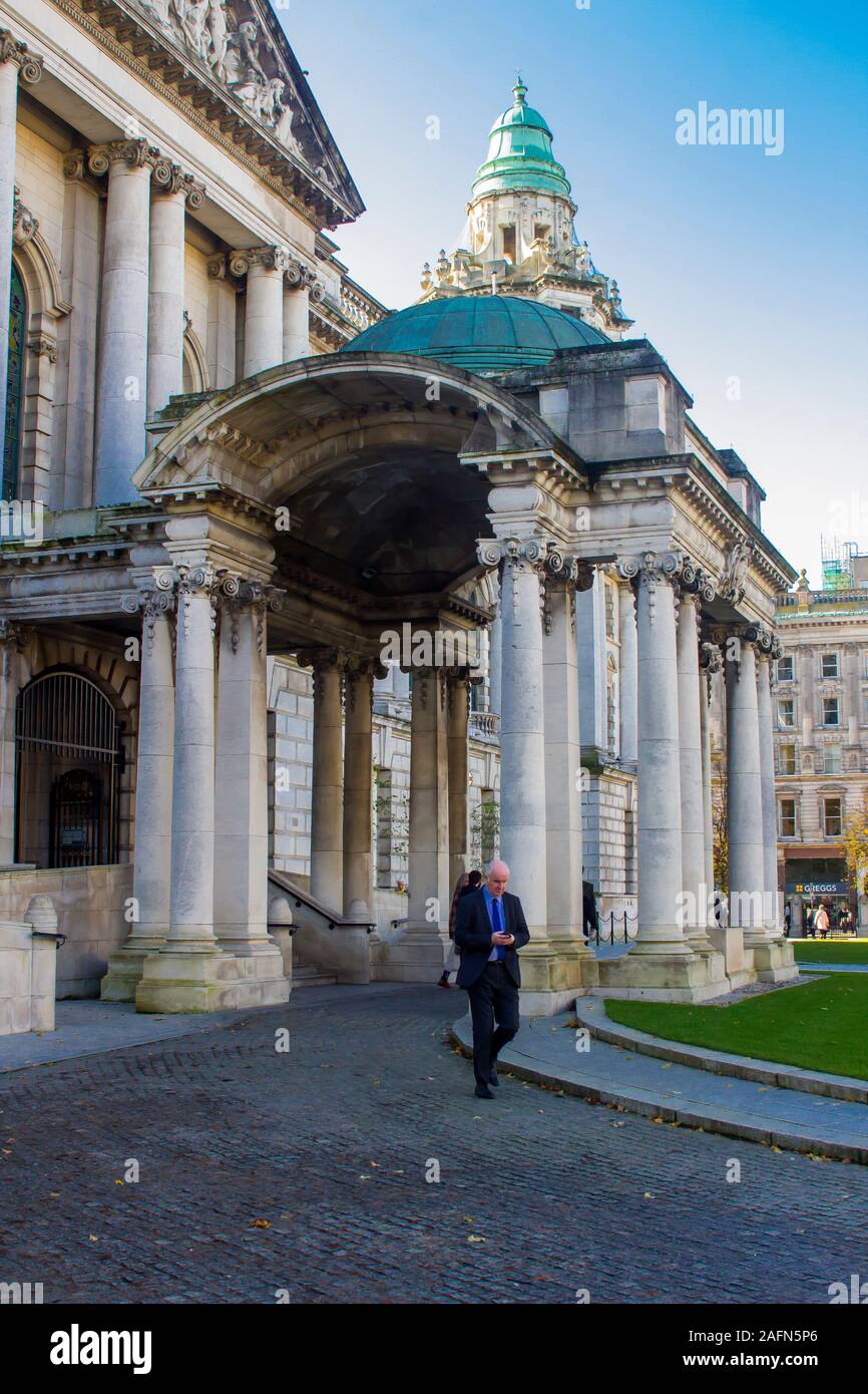 16 October 2019 The green copper domed entrance to Belfast's City Hall with its ornate stone columns in Northern Ireland Stock Photo