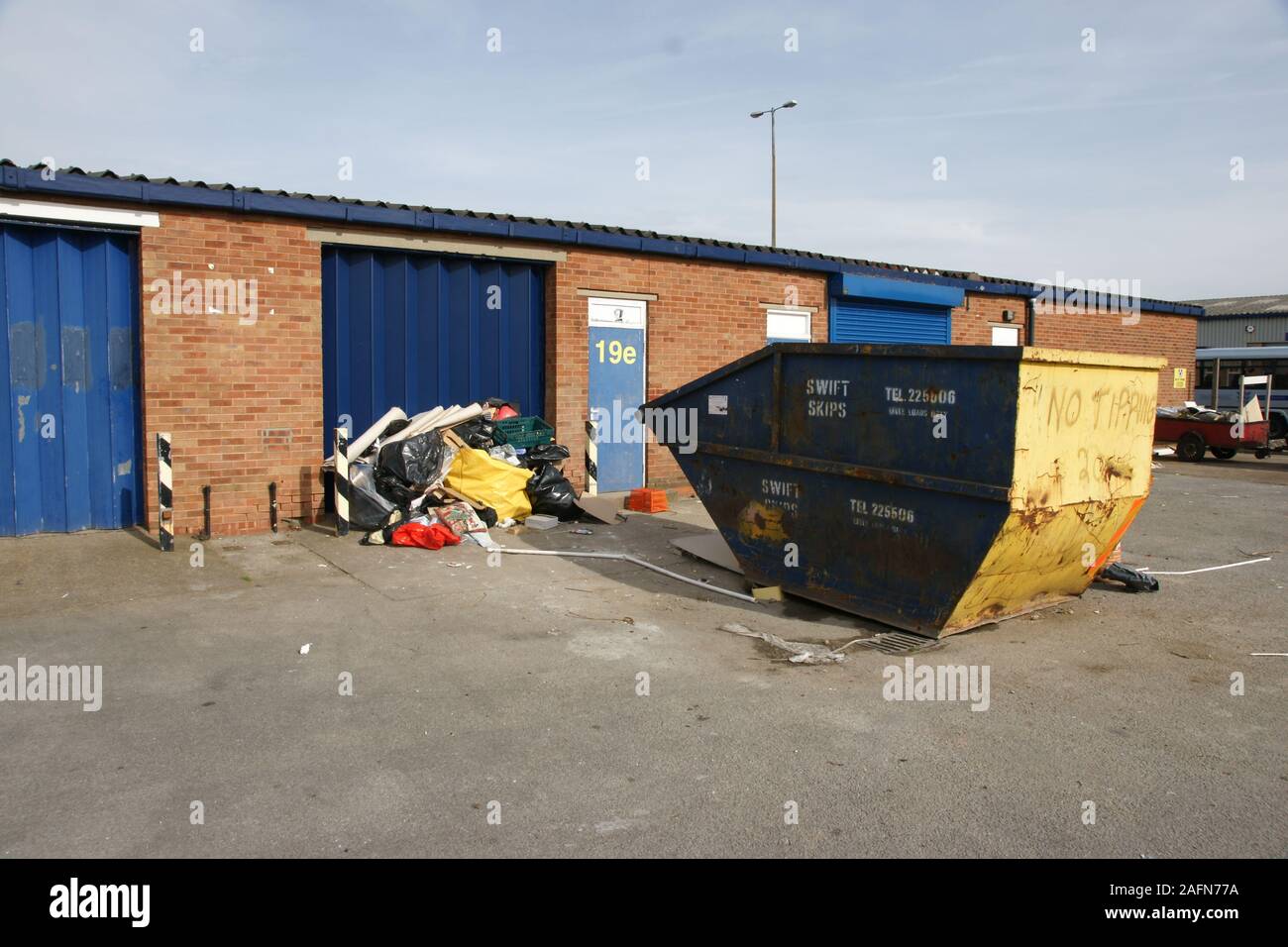 industrial waste disposal, fire loading Stock Photo