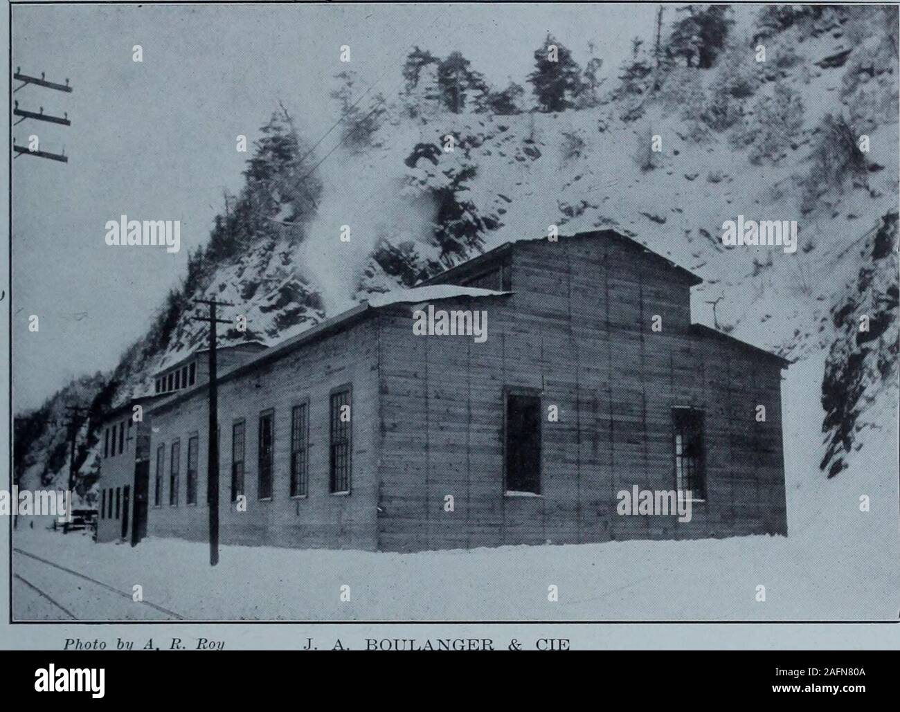 . The town of Levis & environs P.Q. Canada, 1912. LEVIS 3i. Photo by A. R011 BOULANGER & CIE Manufacturers of Iron Castings of all kinds Manufacturer de pieces en fonte wages paid out aggregate established 21 years ago with an au-thorized capital of $49,000. The worksoccupy up-to-date premises of morethan 225,000 square feet modernly e-quipped, where are manufactured sta-tionary hoisting and portable engines,boilers, turbines, water works suppliesand wood working machinery of allkinds. Some 30 people are employed,and theyearly about $15,000 Besides the production of new ma-chinery and repair w Stock Photo