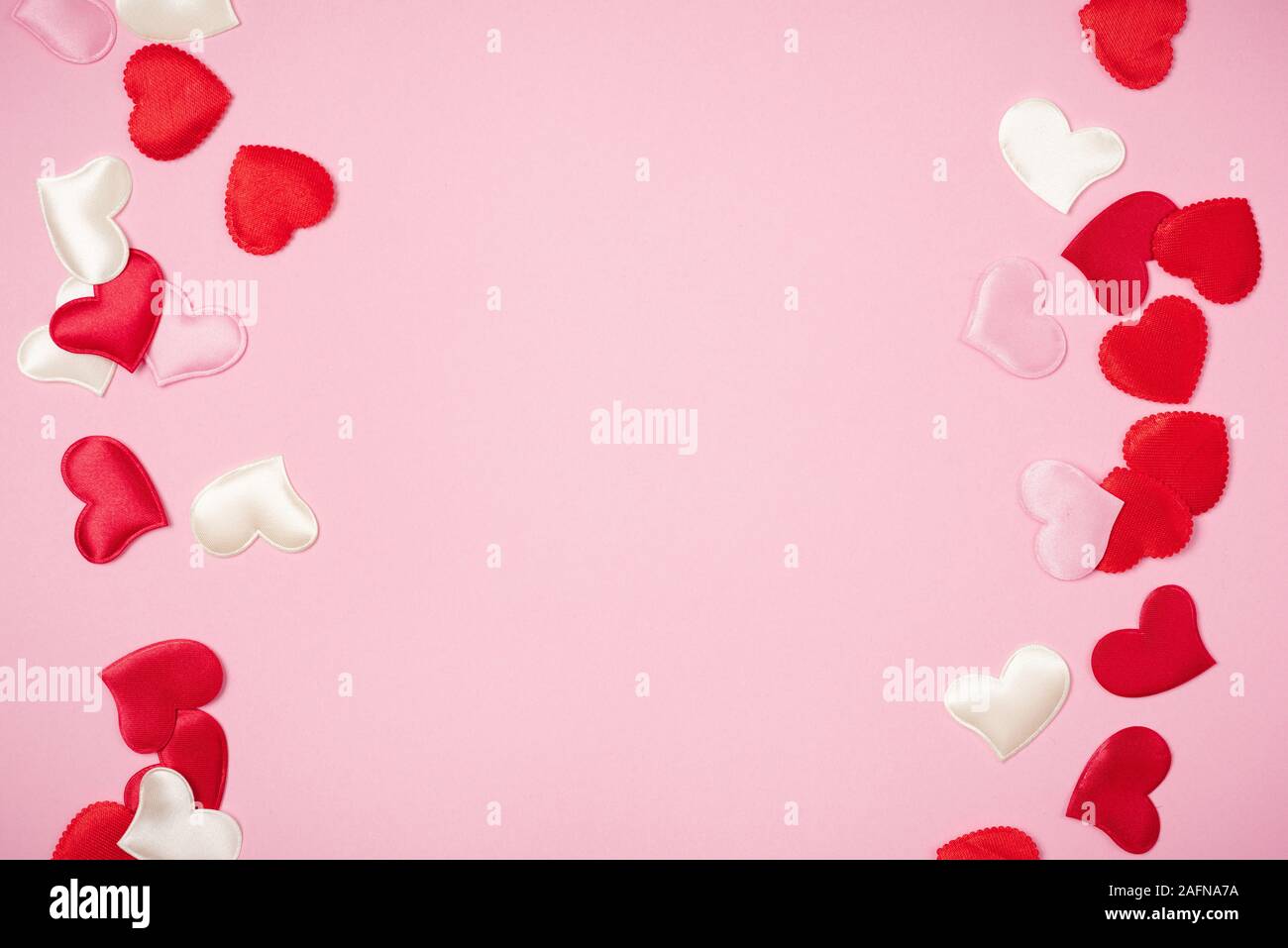 Red hearts for Valentine's day on a beautiful pink background Stock ...