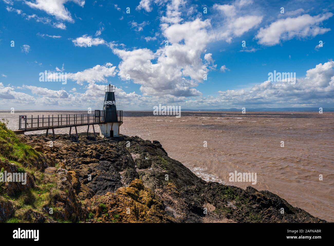 The Portishead Point Lighthouse with the Bristol Channel in the background, seen in Portishead, North Somerset, England, UK Stock Photo