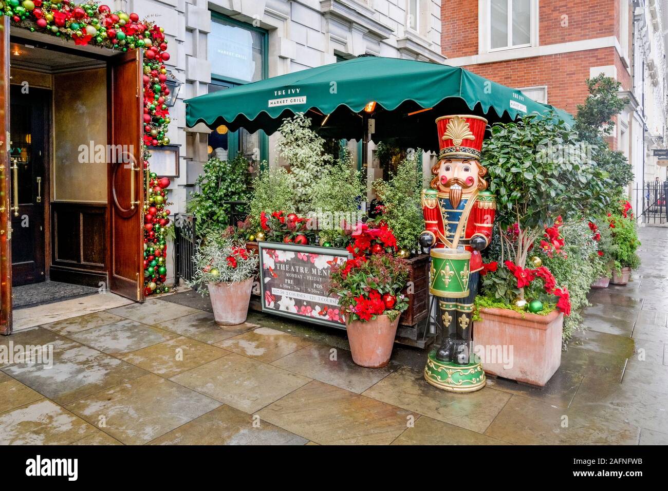 Nutcracker figurine outside the Ivy Market Grill, London, England Stock Photo Alamy