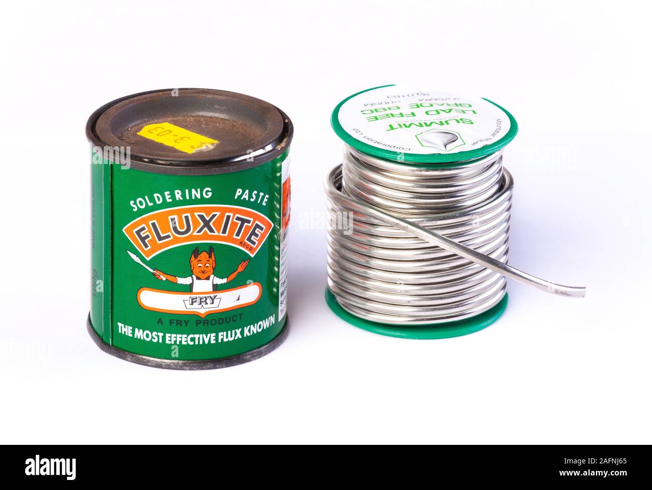 lead free solder wire and tin of flux for plumbing pipe joints Stock Photo