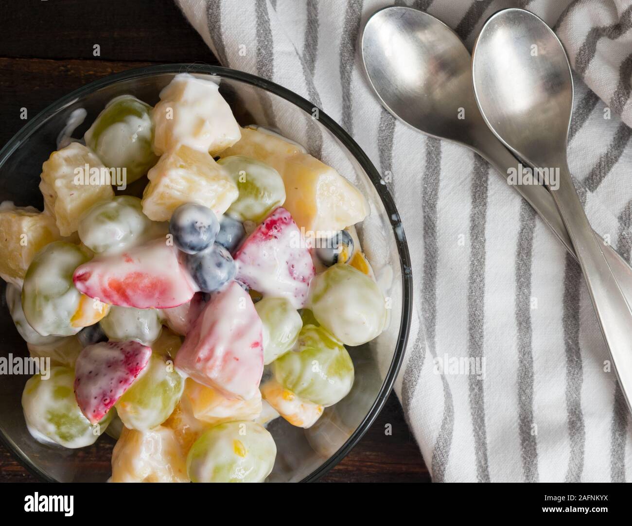 Healthy Ambrosia Fruit Salad with Vanilla Yogurt Dressing Stock Photo