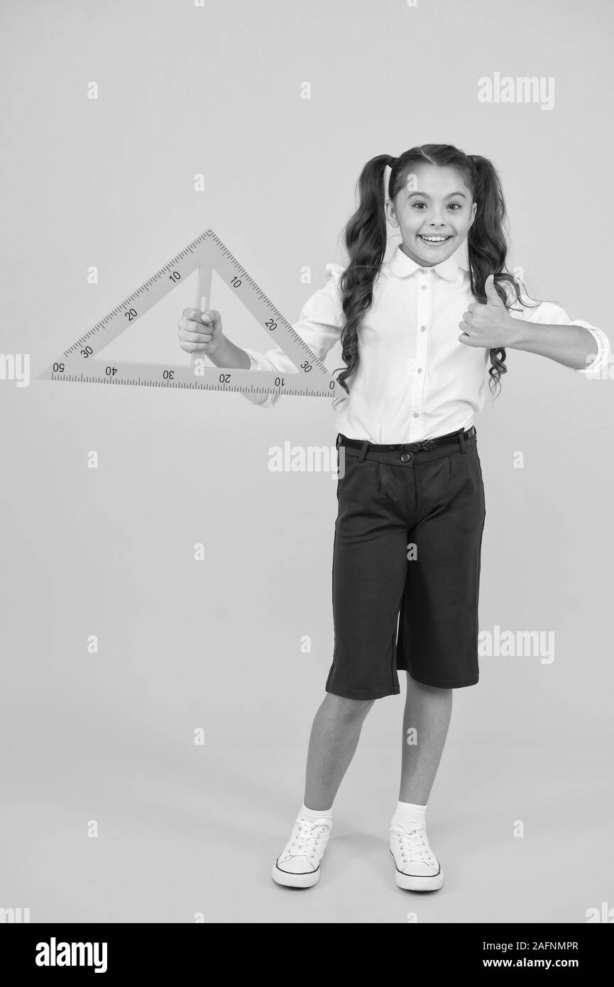 Triangle right angle. Knowledge day. Schoolgirl school uniform hold big ...