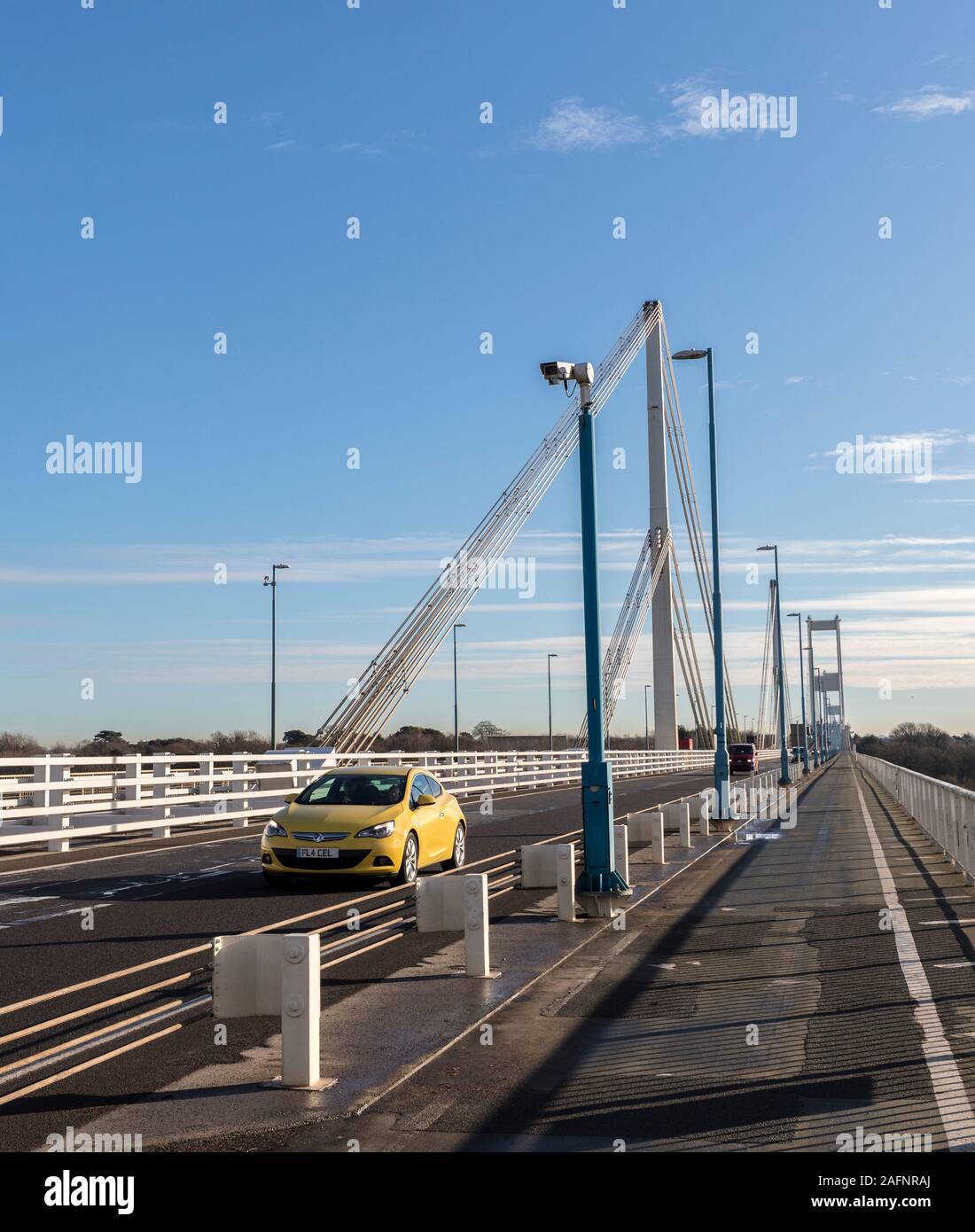 Car on Severn Bridge river crossing with traffic camera, Chepstow, UK Stock Photo