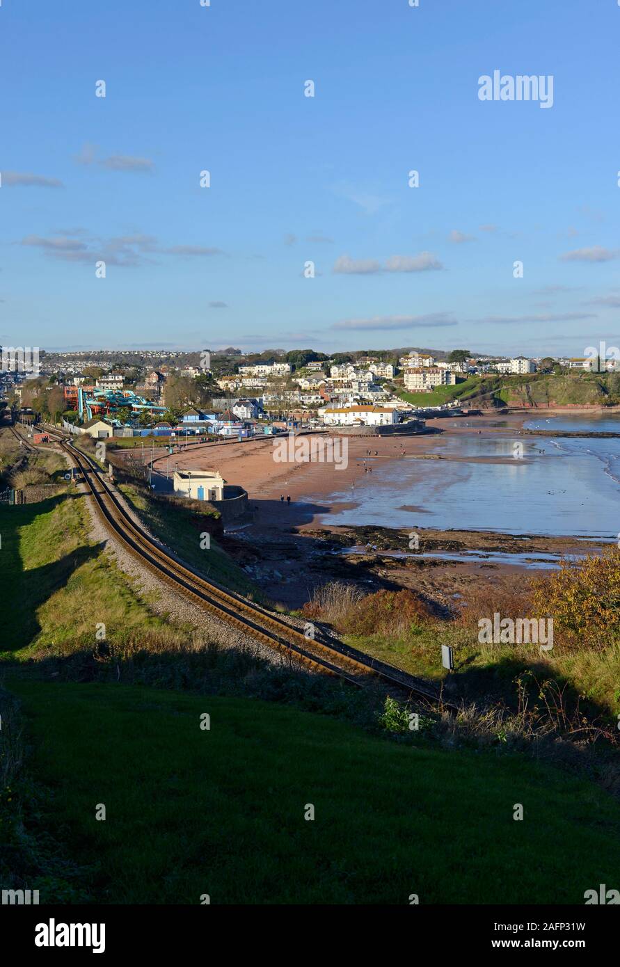 View of Goodrington Sands, Paignton, Devon, from the south, with the track of the Paignton and Dartmouth steam railway in the foreground. Stock Photo