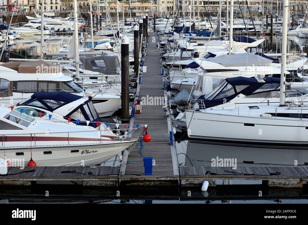 Many yachts and other boats seen moored in the harbour at Torquay, Devon, UK. Stock Photo
