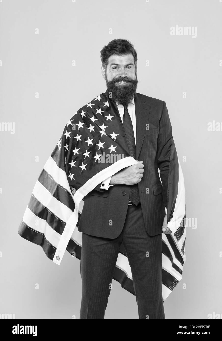 Successful businessman lawyer or politician. Business people. Independence Businessman bearded man in formal suit hold flag USA. Businessman concept. means decide according to law and facts. Stock Photo