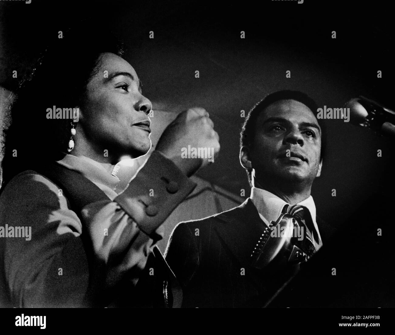 Coretta Scott King, widow of the slain civil rights leader Dr. Martin Luther King, Jr., stands with Andrew Young as he sheds a tear as he concedes defeat in his first run for the Georgia 5th District Congressional race on election night 1970. Young's longtime friend and lieutenant to Martin Luther King, Jr. - To license this image, click on the shopping cart below - Stock Photo