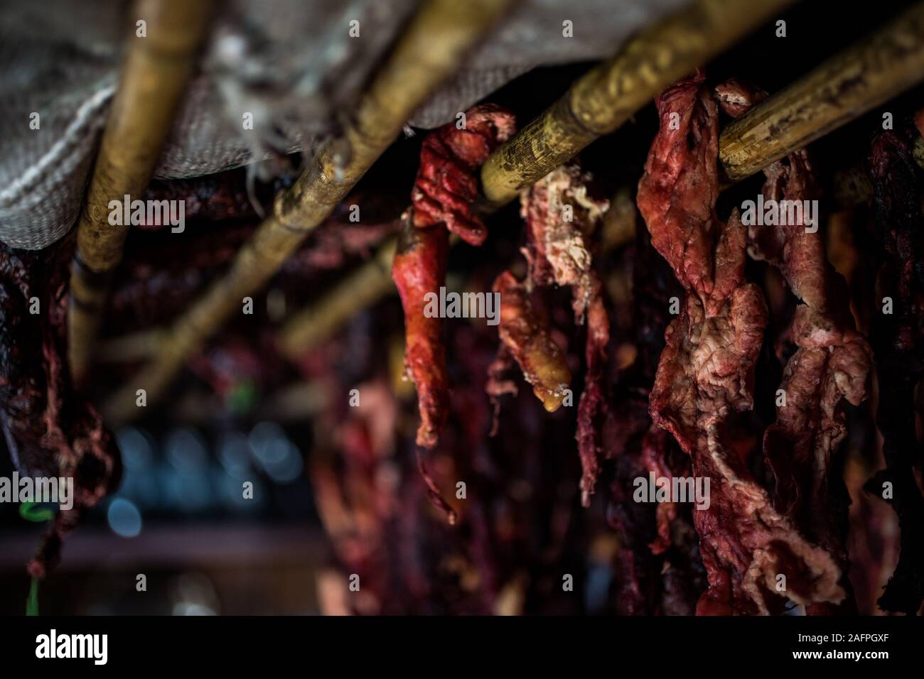 Yak Meat Hangs to Cure in Nepalese Home Stock Photo