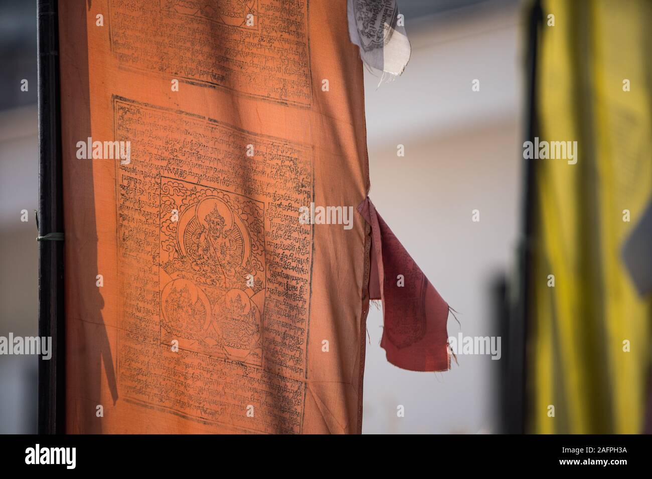 Prayer flag close up in the sun Stock Photo