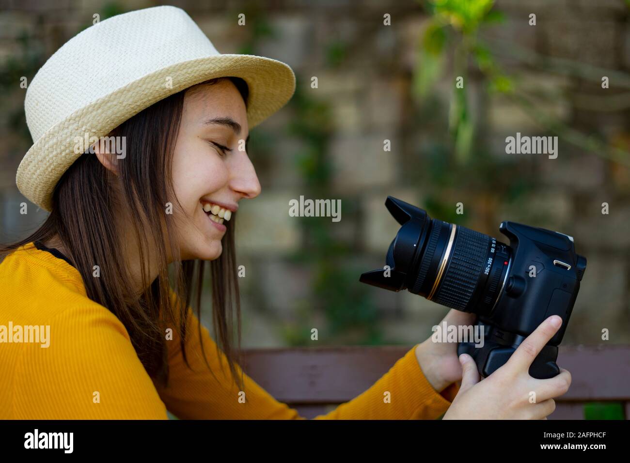 Woman vlogger and creator of audiovisual content recording a video for her fashion blog. Influencer concept. Stock Photo