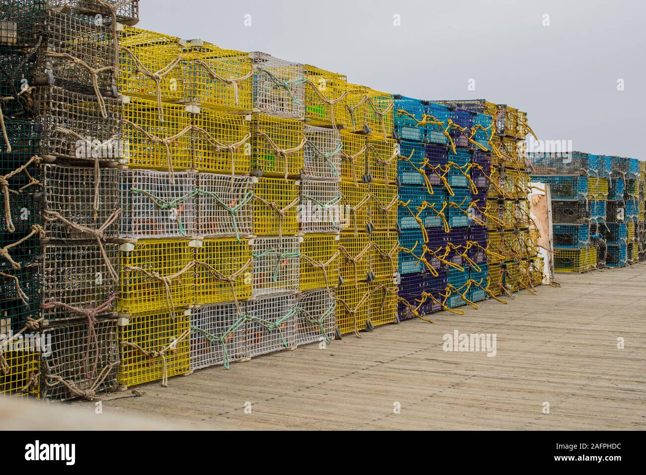 Lobster Traps stacked on Cape Porpoise fish pier. Commercial fishing is very popular here. Cape