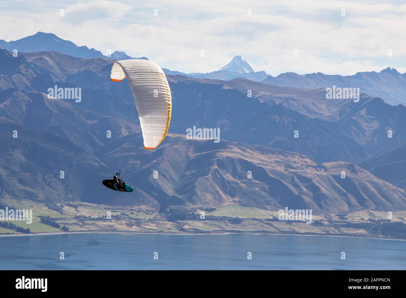 Paraglider in the mountains of New Zealand Stock Photo