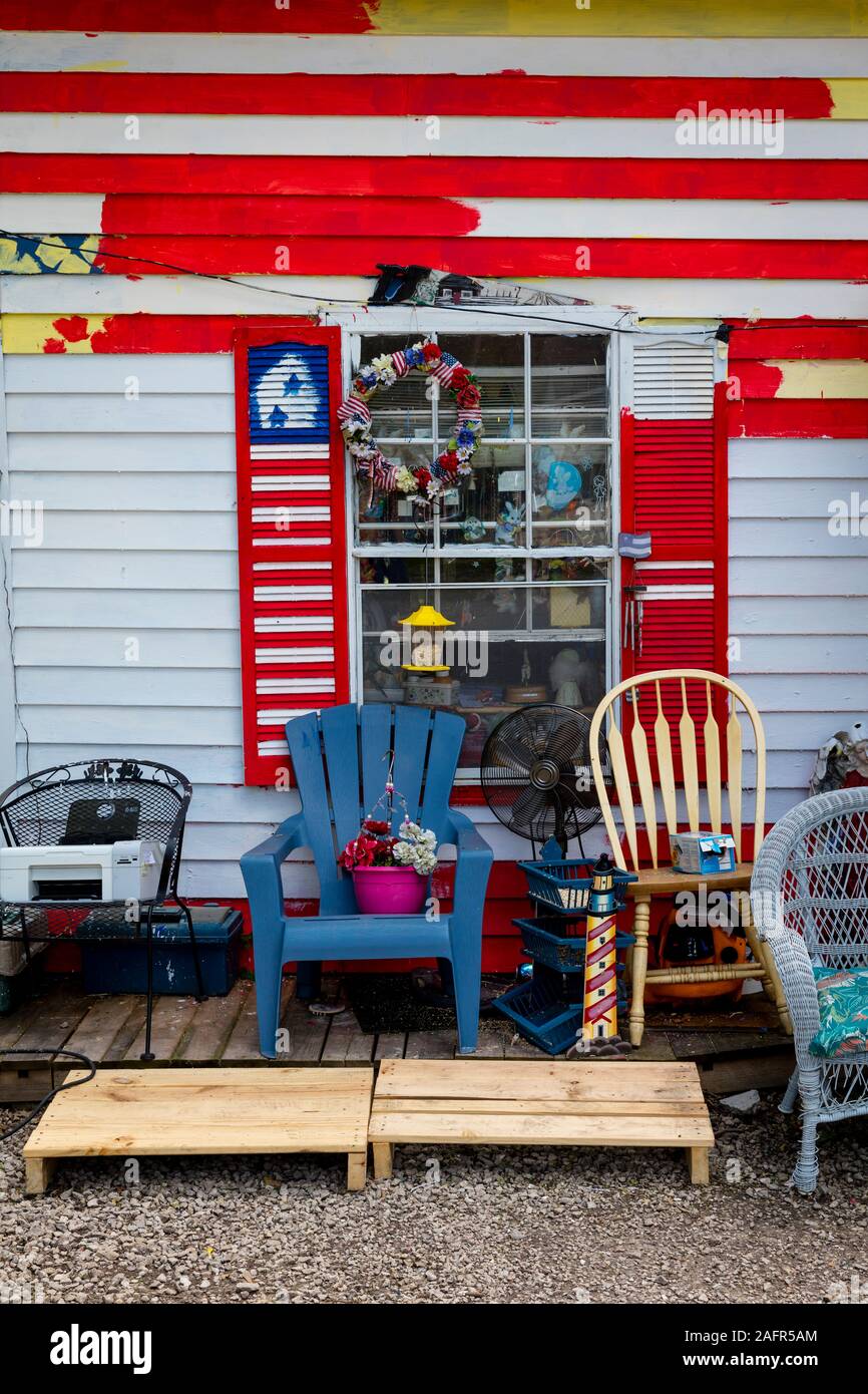 MAY 17 2019,  GASCONADE COUNTY, MISSOURI, USA quaint house with stuff on porch in Gasconade County Missouri, not far from Jefferson City, MO. Stock Photo