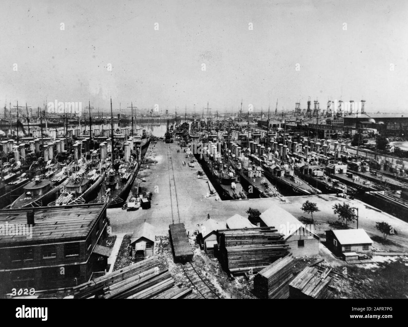 Destroyers mothballed -  View of part of 128 destroyers that saw action in World War I in storage at the Philadelphia Navy Yard, 18 October 1923. Note that the guns and other vital parts that are exposed to the weather are covered with grease so that the ships could be ready for service at a moment's notice. Stock Photo