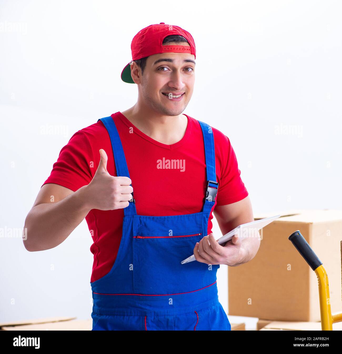 The contractor worker moving boxes during office move Stock Photo