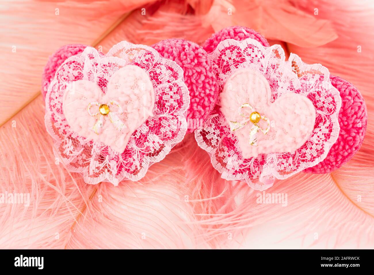 Two pink hearts hi-res stock photography and images - Alamy