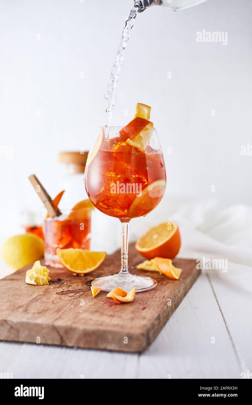 Alcoholic cocktail with orange peel and ice Stock Photo Alamy