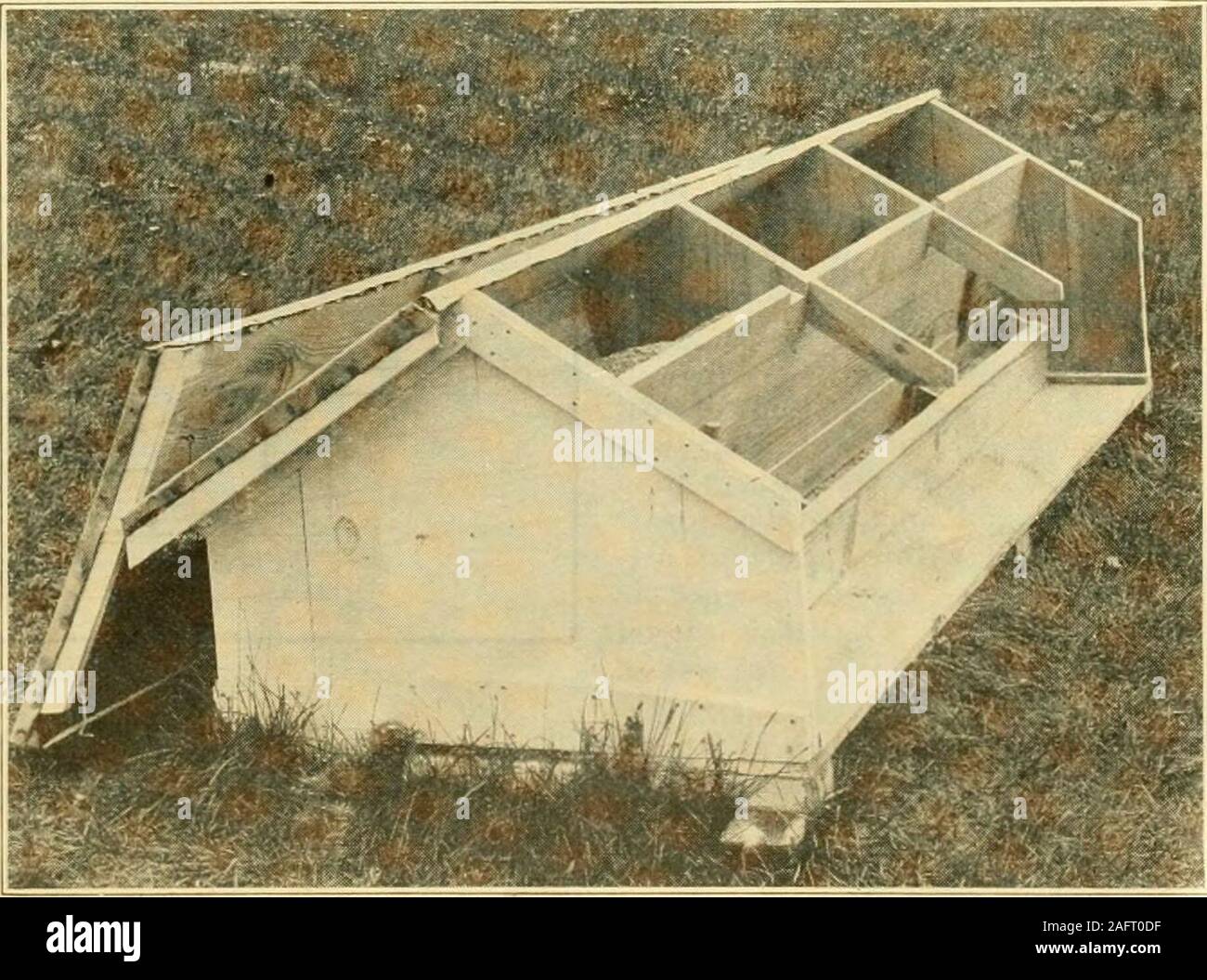 . Poultry houses and fixtures. How to lay out poultry plants ... FIG. 227—OUTDOOR COOP FOR BROODING HE.N.S ness develops they can be broken up more quickly andwill be ready to start laying again in much shorter timethan will be the case if they are allowed to sit for severaldays before being placed in confinement. The best wayto break them up is to confine them to a suitable coopsuch as the one shown in Fig. 227. In warm weather it is more satisfactory, as a rule,to have the broody hens confined to these outdoor coopsrather than indoor coops such as are illustrated on page9L This outdoor coop Stock Photo