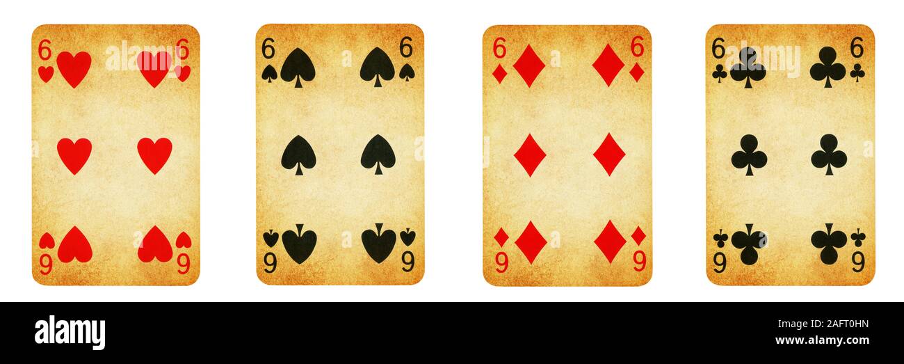 Four Vintage Playing Cards Isolated on White Background, Showing Six from Each Suit - Hearts, Clubs, Spades and Diamonds Stock Photo